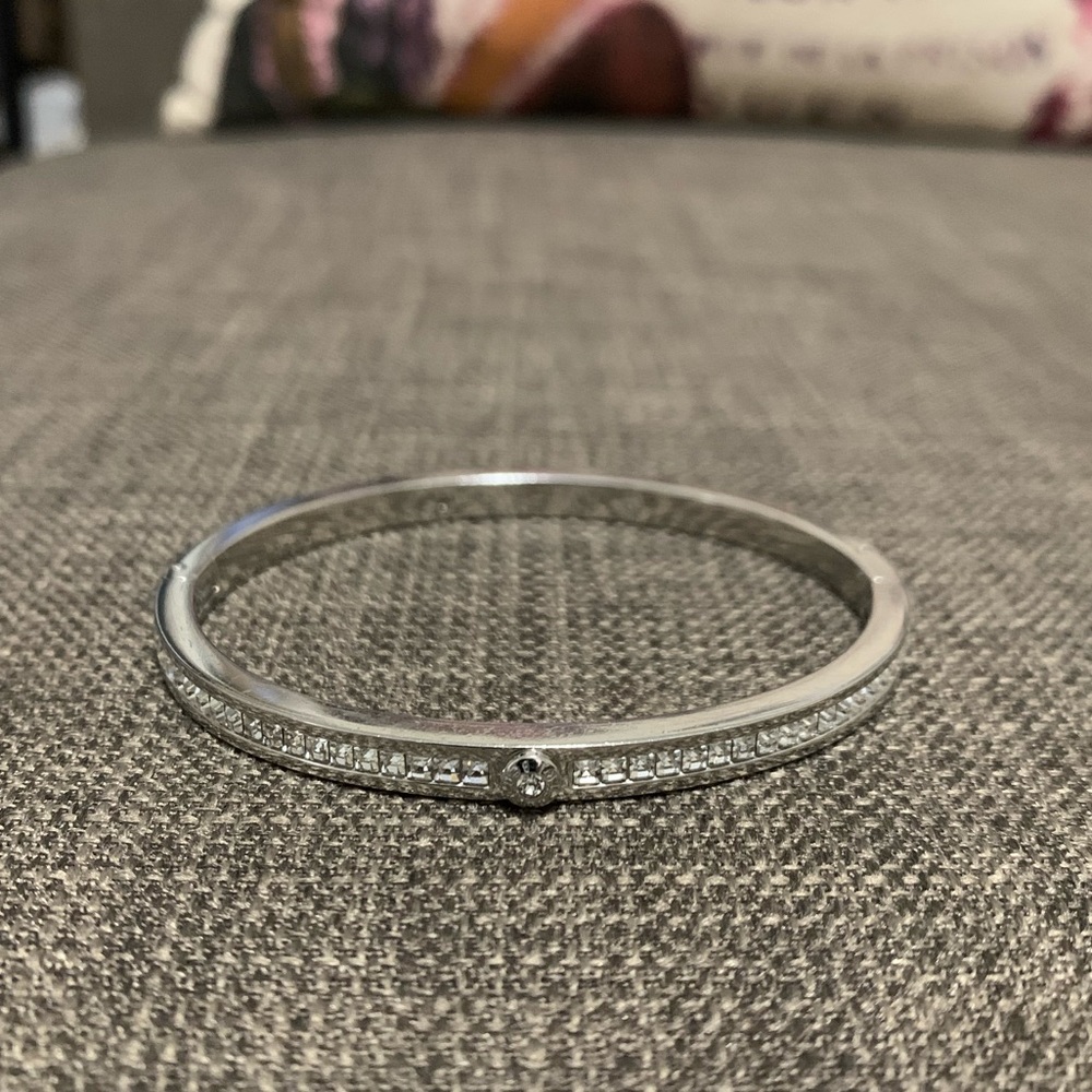Henri Bendel bangle in silver tone